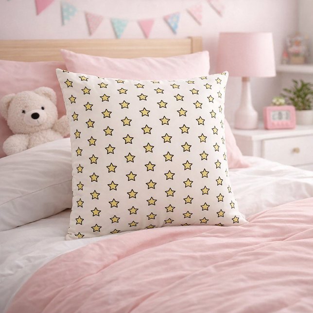 Yellow Star Pattern Half Drop Repeat Cushion (A throw pillow with a cute yellow and black star pattern.)