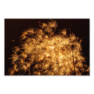 Yellow starburst fireworks against black sky photo print