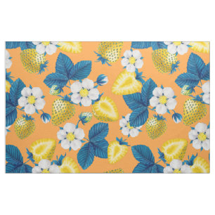 Yellow strawberries on orange fabric