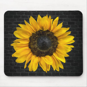 yellow sunflower on brick mouse pad