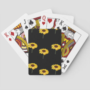 Yellow sunflowers on black playing cards