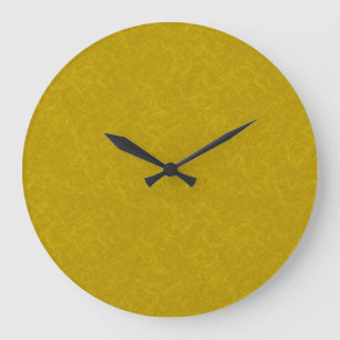 Yellow textured surface with  swirling pattern large clock