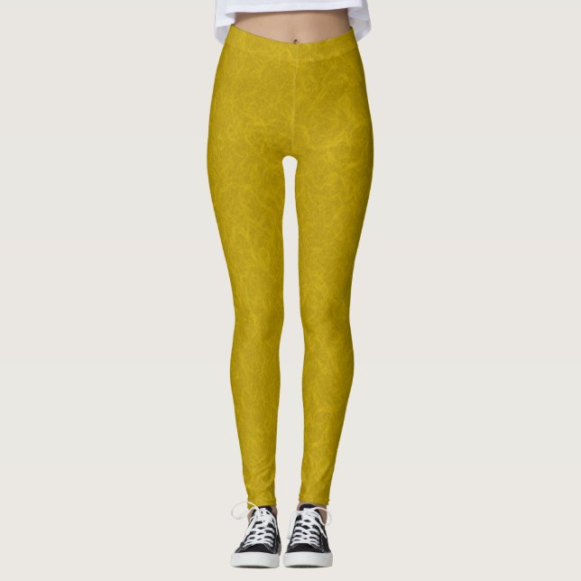 Yellow textured surface with  swirling pattern leggings (Front)