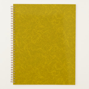Yellow textured surface with swirling pattern planner