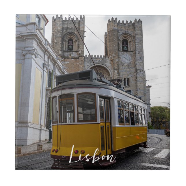 Yellow tram on Lisbon Cathedral in Portugal Ceramic Tile (Front)