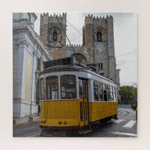 Yellow tram on Lisbon Cathedral in Portugal Jigsaw Puzzle