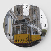 Yellow tram on Lisbon Cathedral in Portugal
