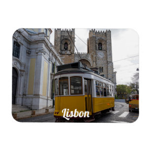 Yellow tram on Lisbon Cathedral in Portugal Magnet
