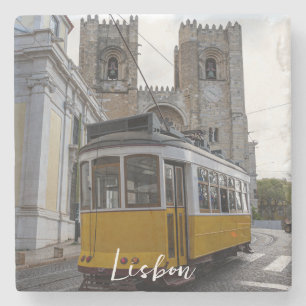Yellow tram on Lisbon Cathedral in Portugal Stone Coaster