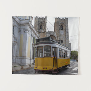 Yellow tram on Lisbon Cathedral in Portugal Tapestry