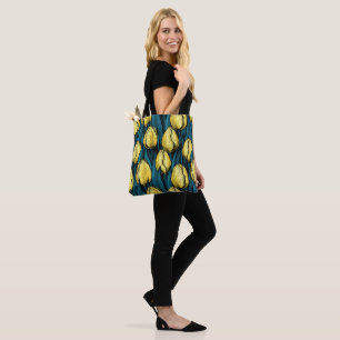 Yellow tulips with blue leaves tote bag