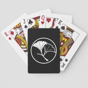 Yin and yang ginkgo leaves in threadlike ring playing cards