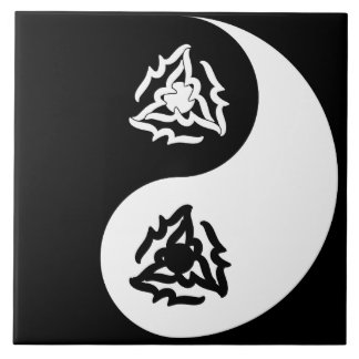Yin and yang sign in black and white ceramic tile