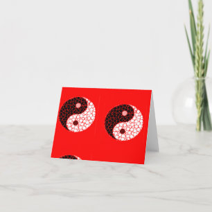 Ying yang circles on red card