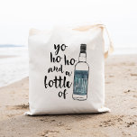 Yo Ho Ho Bottle of Rum Tote Bag<br><div class="desc">Yo ho ho and a bottle of rum! Enjoy the pirate life with this tote bag featuring a rum bottle watercolor illustration and brushstroke text. Fun for home bars,  parties,  beach houses... or wherever cocktails are served!</div>