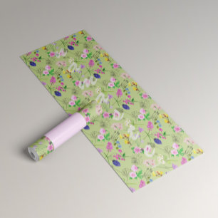 Yoga for women with delicate flowers on green yoga mat