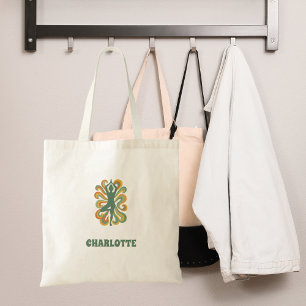 Yoga pose swirls green orange name retro tote bag