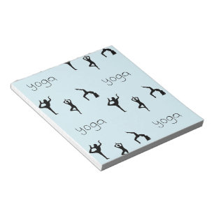 Yoga poses and text pattern on blue notepad