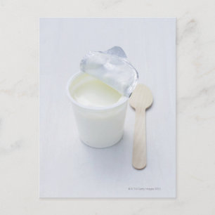 Yoghurt in opened disposable cup postcard