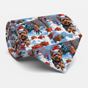Yorkshire Terrier in Snow with Christmas Hat Tie