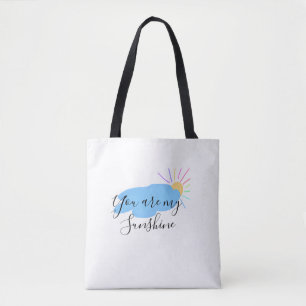 you are my sunshine yellow orange sun rays clouds tote bag