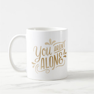 you aren't alone coffee mug
