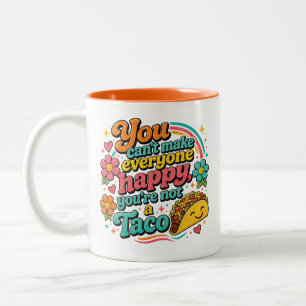 "You can't make everyone happy, you're not a Taco. Two-Tone Coffee Mug