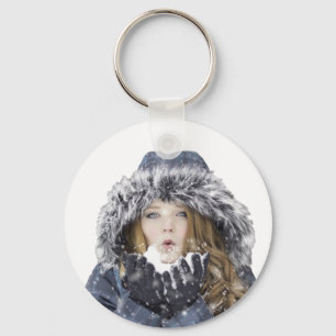 Young beautiful girl in winter key ring