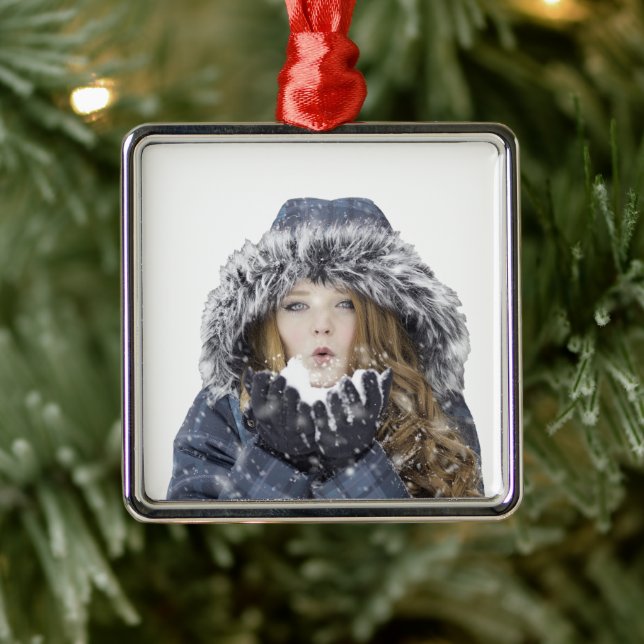 Young beautiful girl in winter metal ornament (Tree)