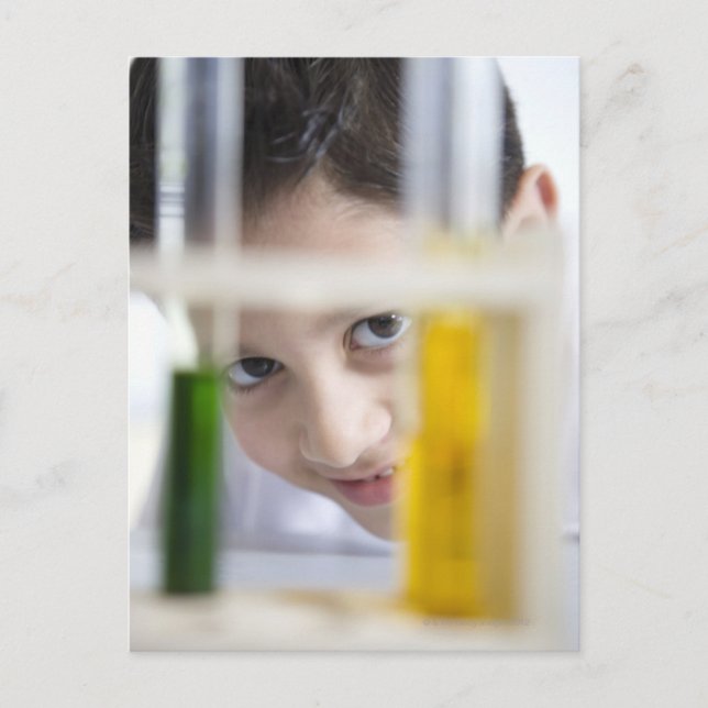 Young boy in chemistry science class, looking postcard (Front)