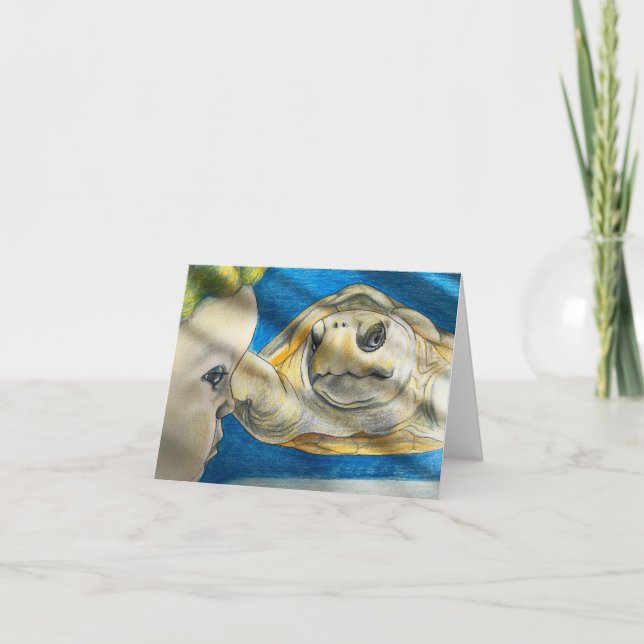 Young child observing turtle card (Front)