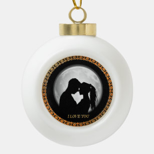 Young couple black silhouette kissing one another ceramic ball christmas ornament