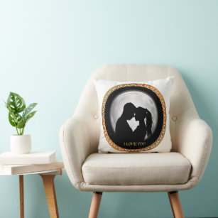 Young couple black silhouette kissing one another cushion