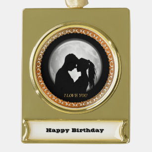 Young couple black silhouette kissing one another gold plated banner ornament