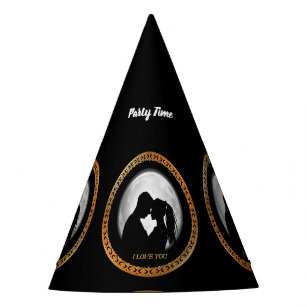 Young couple black silhouette kissing one another party hat