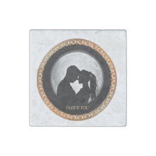 Young couple black silhouette kissing one another stone magnet