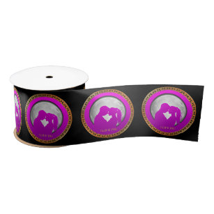 Young couple pink silhouette kissing one another satin ribbon