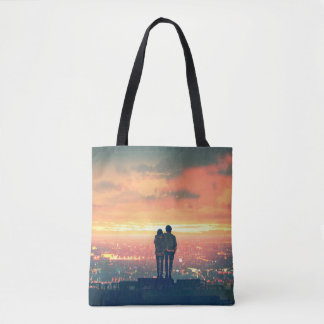 young couple standing on the roof top looking at c tote bag