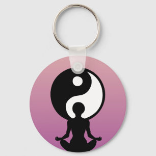 Young girl practicing yoga key ring