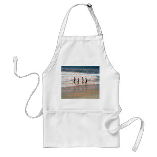 Young girls at beach in ocean -- poetry standard apron
