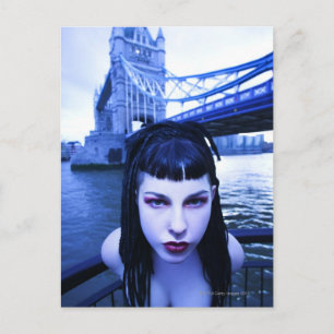 Young Goth woman leaning suggestively near Tower Postcard