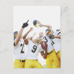 Young sportsmen playing rugby postcard