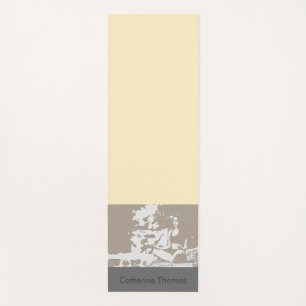 young woman in a yoga pose mat