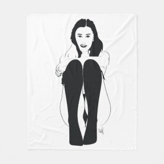 Young woman sitting fleece blanket