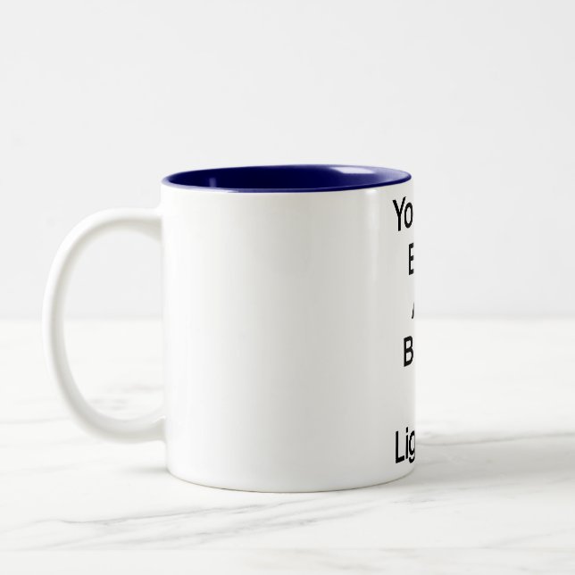 You're as bright as a burned out lightbulb Two-Tone coffee mug (Left)