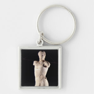 Youth clad in tight long-fitting tunic, 5th centur key ring