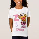 Z is for Zoe | Add Your Name T-Shirt<br><div class="desc">Celebrate Sesame Street fun with this personalised t-shirt featuring Zoe and the letter "Z." Accented with vibrant colours and playful details,  this design allows you to add your name,  making it a unique and cheerful addition to your wardrobe. Perfect for fans of Zoe and Sesame Street of all ages.</div>