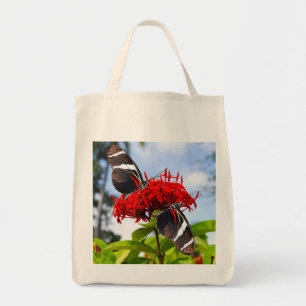 Zebra longwing butterflies on red flowers tote bag