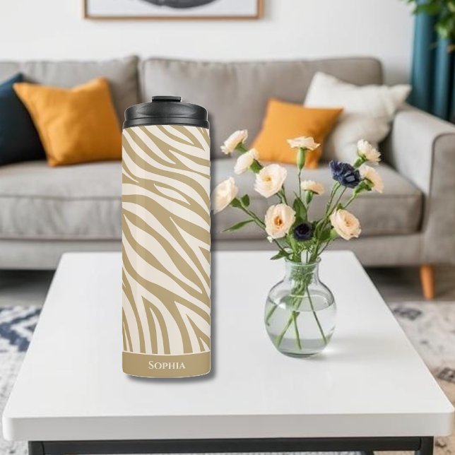 Zebra Print-Beige Thermal Tumbler (Sip in Style with Our Neutral Zebra Print Thermal Tumbler – Where Chic Meets Function.
Stay hydrated)