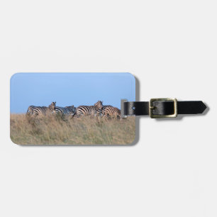 Zebras at dusk luggage tag
